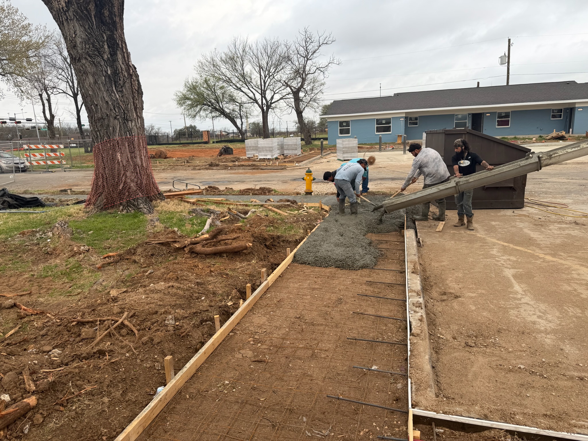 Cameron Park Zoo concrete walkway section with clean edges and site cleanup