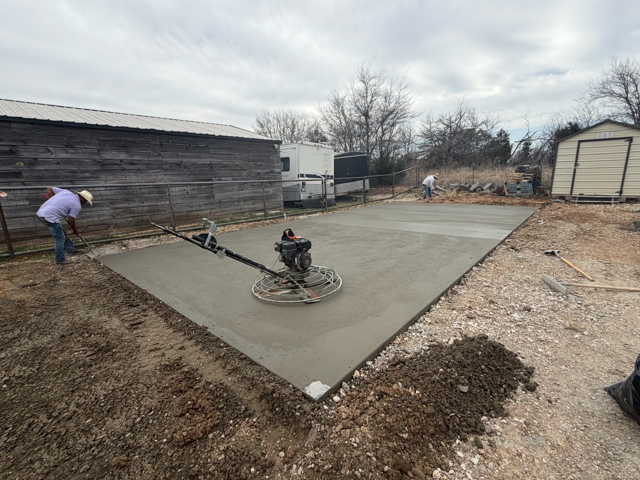 Fresh concrete RV pad being finished in China Spring near Waco, TX