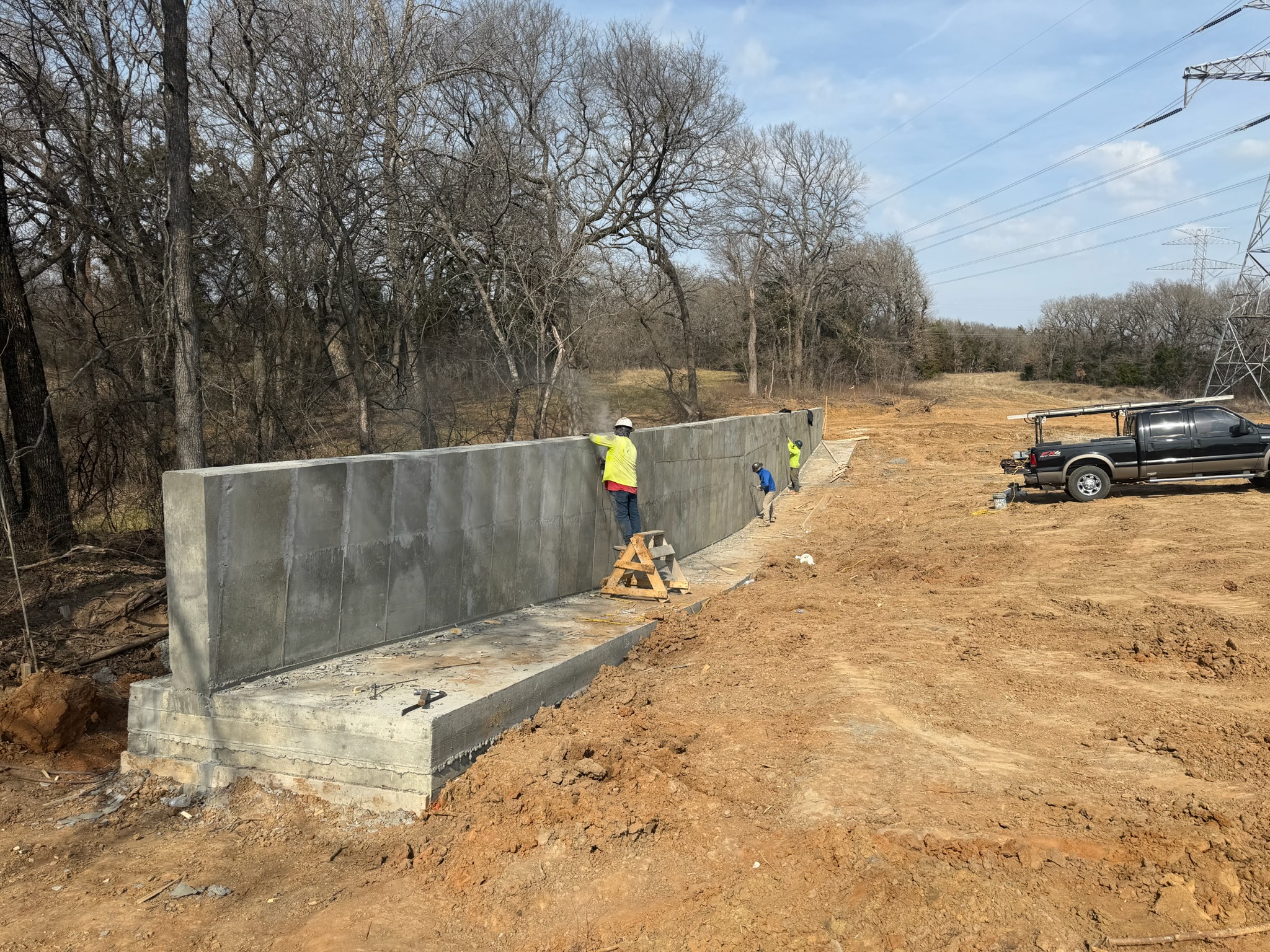 Concrete retaining wall finish work on a Georgetown jobsite