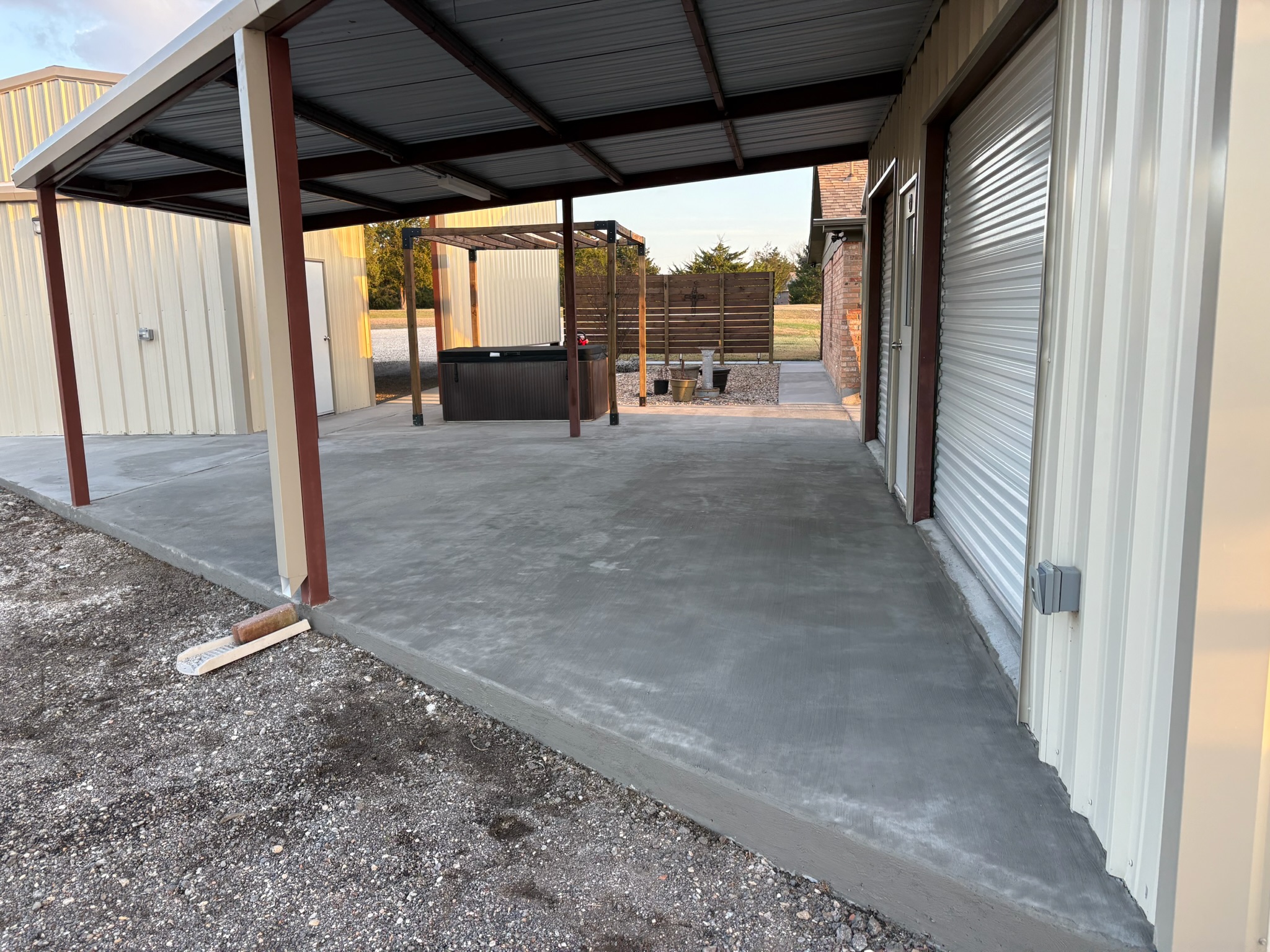 Resurfaced concrete under a covered shop area in Hubbard, TX