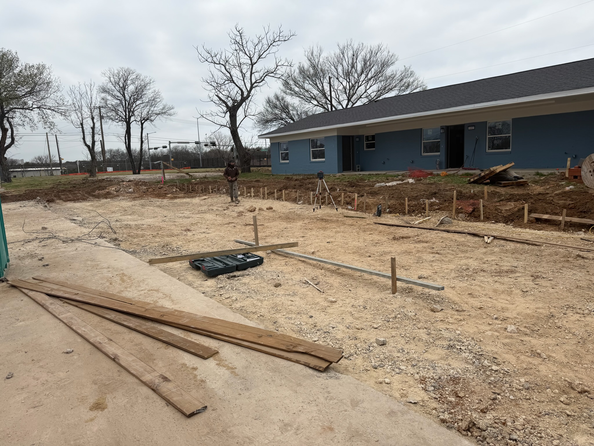 Base prep and form layout for Melody Grove handicap parking concrete in Waco