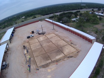 Aerial view of the formed Morton building shop foundation pad in Mount Calm, TX