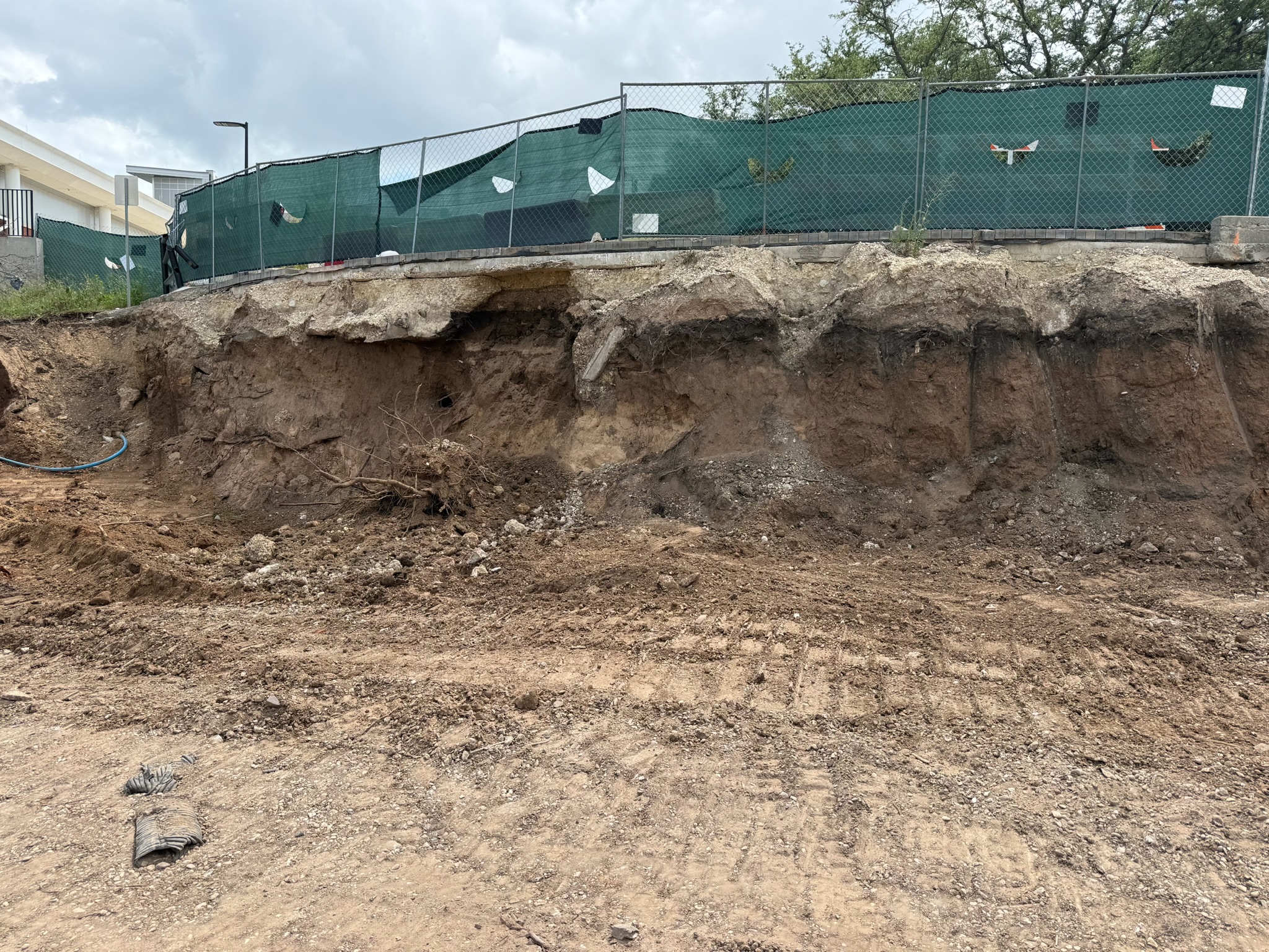 Exposed river bank at the River Walk development before shotcrete stabilization in Waco, TX